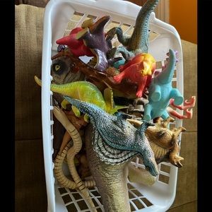 Lot of dinosaurs basket not included